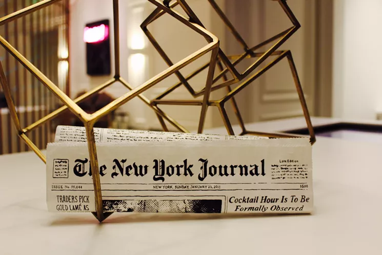 It's a newspaper ... or is it? This unique clutch is just one of Gould's covert assets. - ANTONELLA HOFFECKER