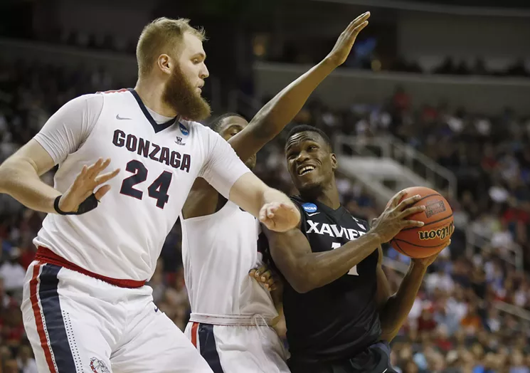 Gonzaga’s impressively bearded Przemek Karnowski guards Xavier’s Malcolm Bernard during the West Region final in San Jose, California. - JIM GENSHEIMER/BAY AREA NEWS GROUP/TNS