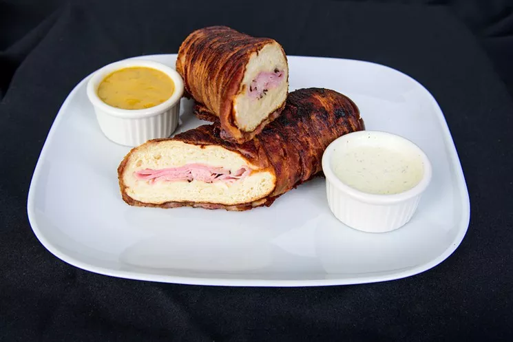 The Bacon-Wrapped Pretzel Baguette is just one of the featured new items at Chase Field this season. - SARAH SACHS/ARIZONA DIAMONDBACKS