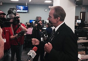 Phoenix Assistant Fire Chief Kevin Kalkbrenner briefs reporters Friday on preparations inside the Emergency Operations Center for NCAA Final Four weekend. - SEAN HOLSTEGE