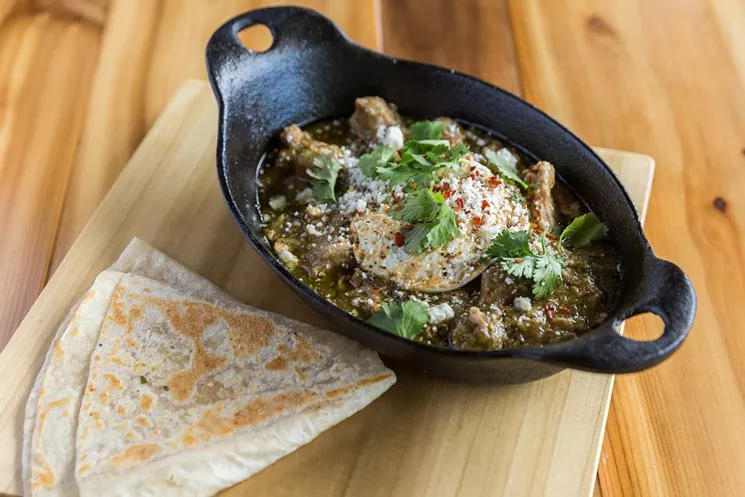 The Smith Café's green chili bowl is made with slow cooked pork and topped with cilantro, cojita, and a cage-free egg. The new Arcadia breakfast spot opened on March 1. - THE SMITH CAFÉ