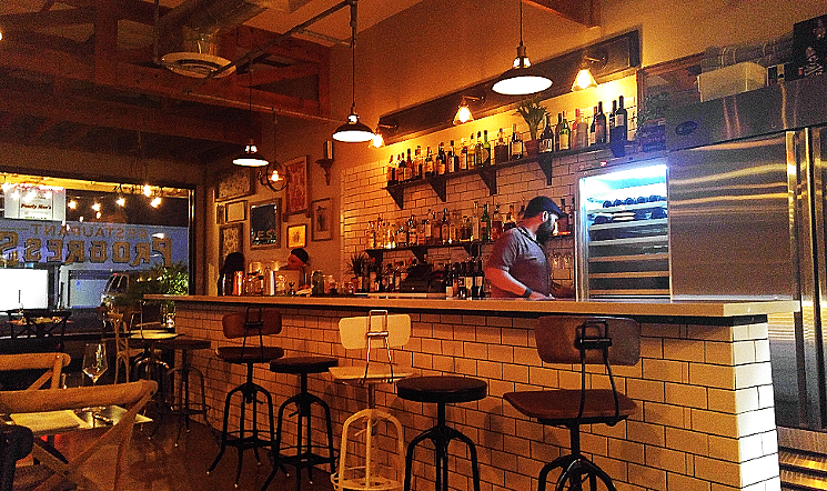 A view of the bar and dining room at Restaurant Progress, a new restaurant located next door to the historic Melrose Pharmacy in Phoenix's Melrose District. - PATRICIA ESCARCEGA