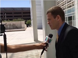 Jack Wilenchik giving an interview in Spanish on Wednesday  outside the federal courthouse in downtown Phoenix. - STEPHEN LEMONS