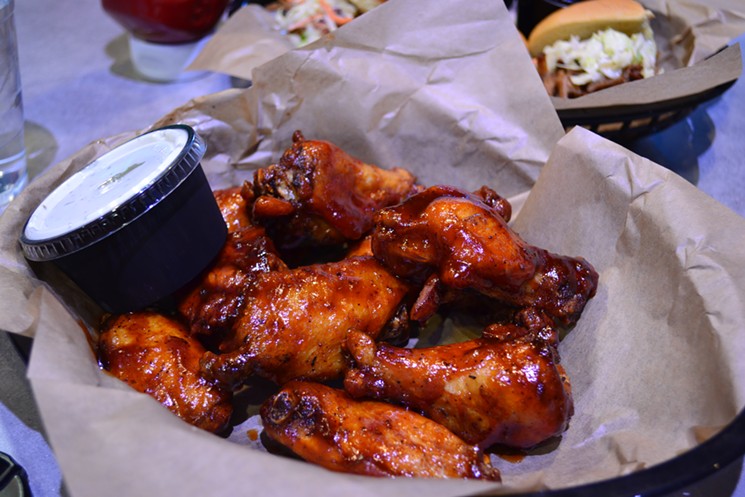 The Pedal Haus Brewery wings are meaty and saucy. - PATRICIA ESCARCEGA