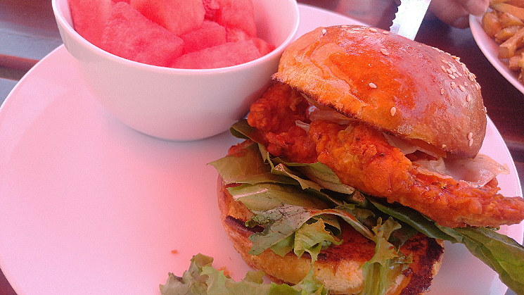 The crispy chicken sandwich known as "Boy I Love Losing Super Bowls" is a highlight of the lunch menu at Handlebar Diner. - PATRICIA ESCARCEGA