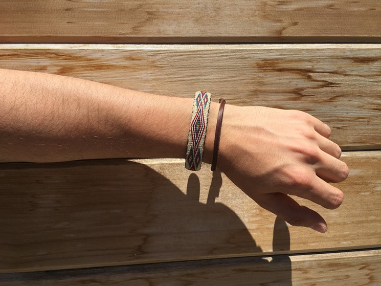 Hahn models his new Chamula bracelet handmade from horsehair down in Mexico. - LARA PIU
