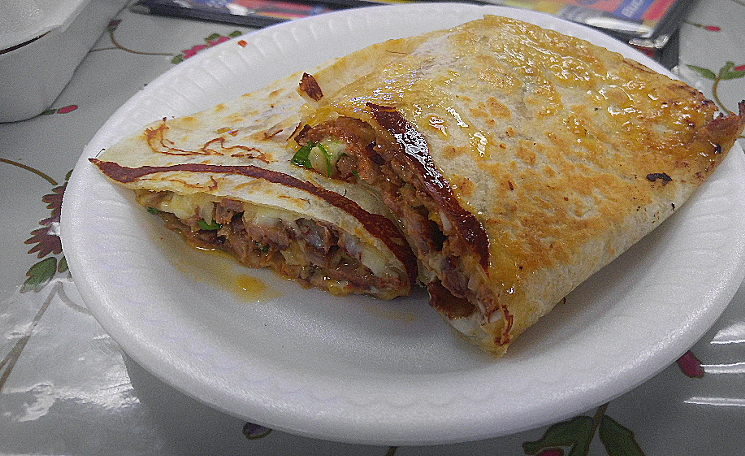 A "gringa" is an al pastor-stuffed quesadilla available at Taquería Don Beto. - PATRICIA ESCARCEGA