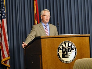 Maricopa County Attorney Bill Montgomery briefs the press last week about the Serial Street Shooter case. - SEAN HOLSTEGE