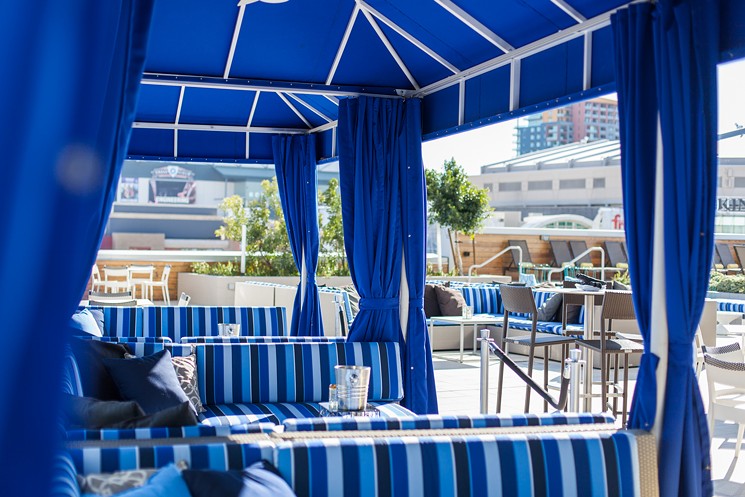 See the Phoenix skyline from the Lustre Rooftop Bar in your private cabana. - COURTESY OF KIMPTON HOTEL PALOMAR PHOENIX