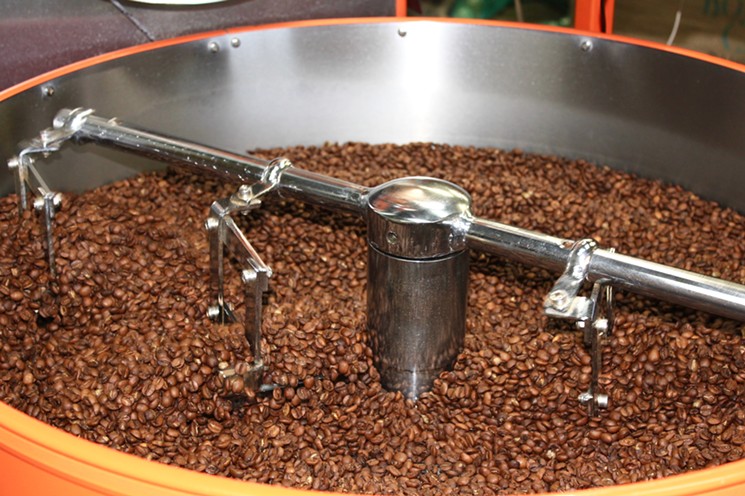 Coffee beans roasting at Infusion Coffee and Tea. - ALYSSA TIDWELL