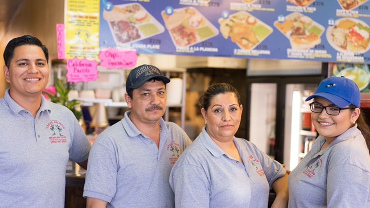 The family behind Tacos Jalisco. From left to right: Jose Reyes Jr., Jose Reyes Sr., Patricia Alvarez, and Stephanie Reyes. - SHELBY MOORE
