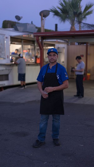 Owner Jose Munoz works Thursday through Sunday, running errands before Los Yaquis opens at 7 p.m. When service ends in the wee hours of the morning, the crew enjoys a family meal. - SHELBY MOORE