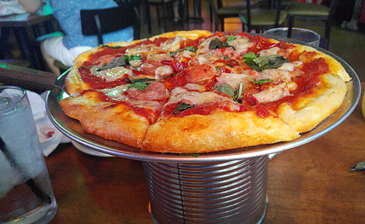 The Everglades pizza at Camp Social features juicy, lightly spicy rounds of alligator sausage. - PATRICIA ESCARCEGA