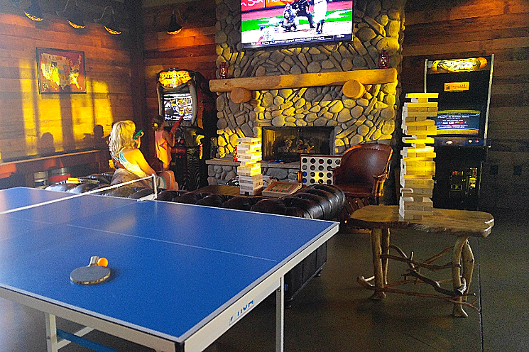 Camp Social has a cozy game room with arcade games, Jenga, and a ping-pong table. - PATRICIA ESCARCEGA