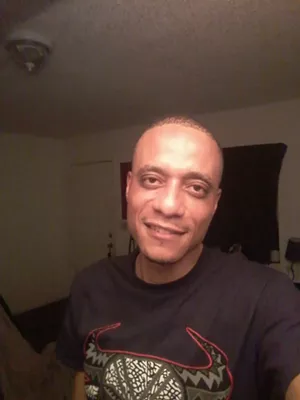 Ivan Spicer, 42, at home in his apartment. He received assistance from a rapid-rehousing program. - COURTESY OF IVAN SPICER