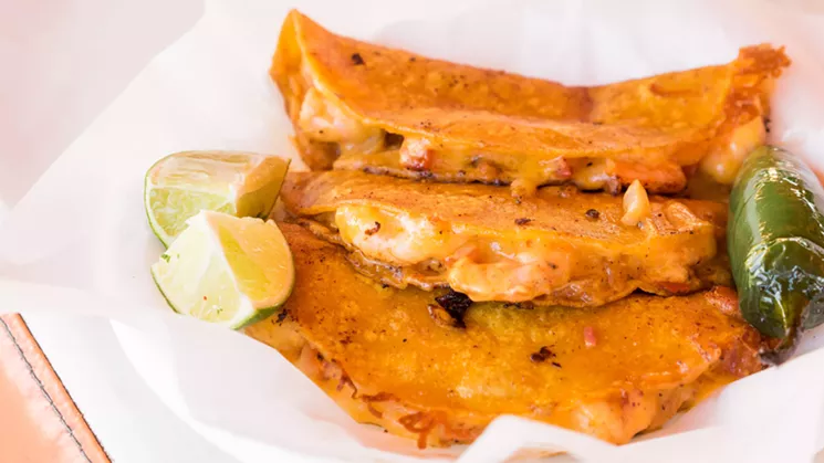 Señor Ozzy’s signature taco is cheesy, rich, and completely satisfying without overpowering the flavor of the shrimp. - SHELBY MOORE
