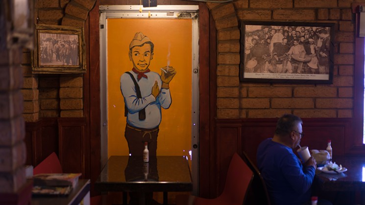 Taquitos Jalisco is filled with old photographs and hand-painted art. - SHELBY MOORE