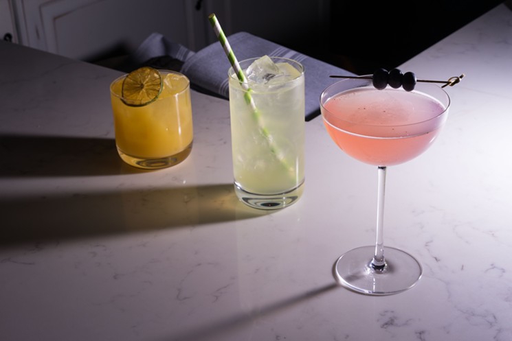 The concise cocktail menu at Restaurant Progress strikes a balance between three lighter cocktails featuring fresh citrus and juices (shown above, often with savory touches) and two darker, boozier options. - SHELBY MOORE