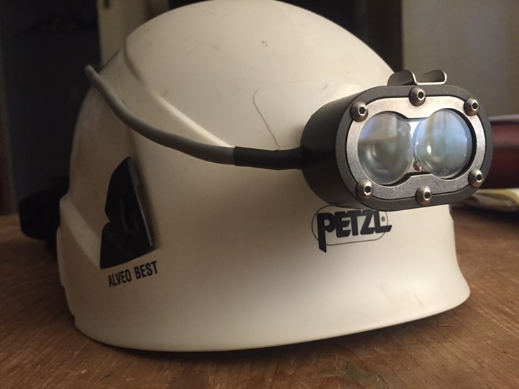 The cool headlamp of bat biologist Angie McIntire. - COURTESY OF ANGIE MCINTIRE