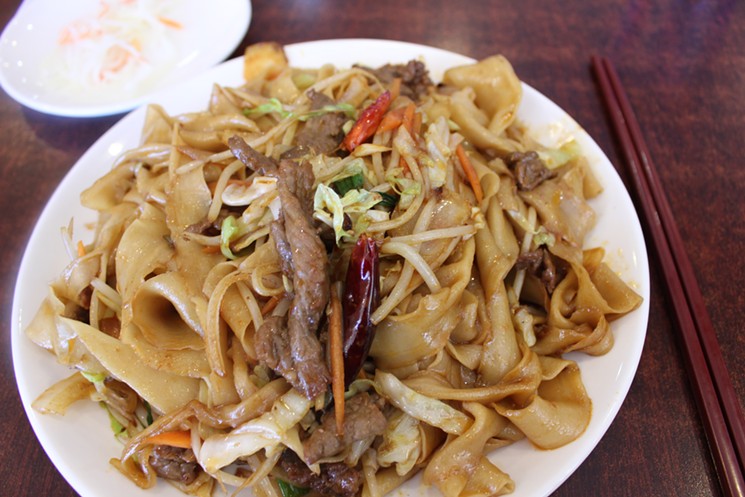Hand-pulled noodles with XO sauce, beef, and vegetables. - CHRIS MALLOY