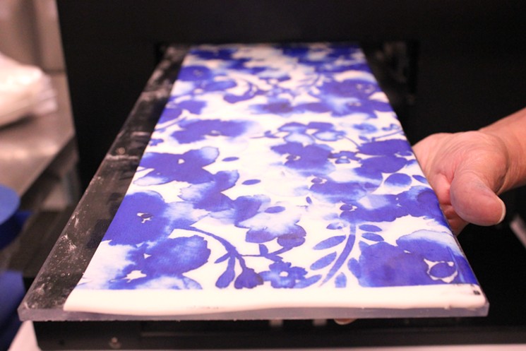 This printer "inks" sugar designs to be wrapped around cakes. - CHRIS MALLOY