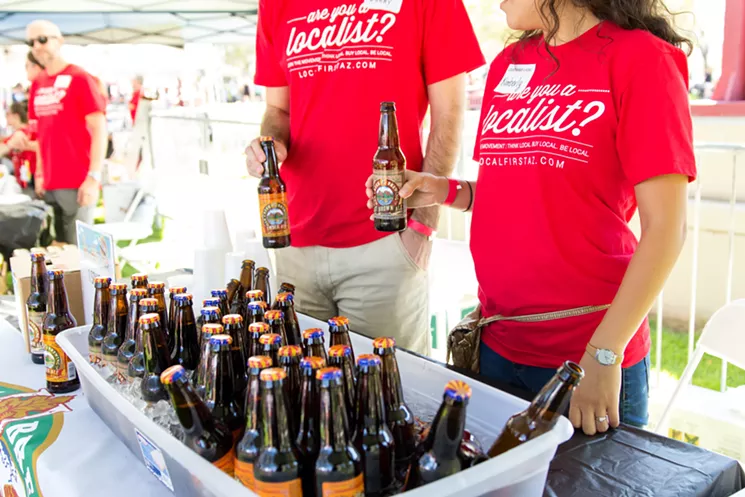 During the Arizona Fall Fest, local businesses sell products and services and offer giveaways. - HARRISON LAI PHOTOGRAPHY