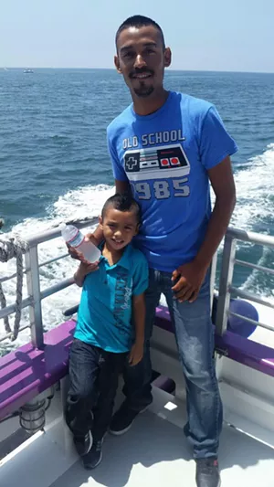 29-year-old Jorge Aranda was arrested at a Phoenix Motel 6 in July. "I want people to know that I just want to be here for my son," he says. - COURTESY OF JORGE ARANDA
