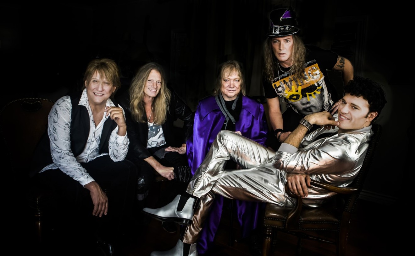 Who's the guy in the purple whatchamacallit? Steve Priest,who's got more than a clue what to do with his new version of The Sweet.