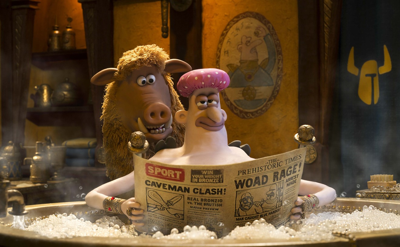 Hognob, a wordless warthog who grunts, wheezes and howls,  finds Lord Nooth (voiced by Tom Hiddleston) in the bathtub during one well-executed scene in Nick Park’s caveman-centric animated feature Early Man.