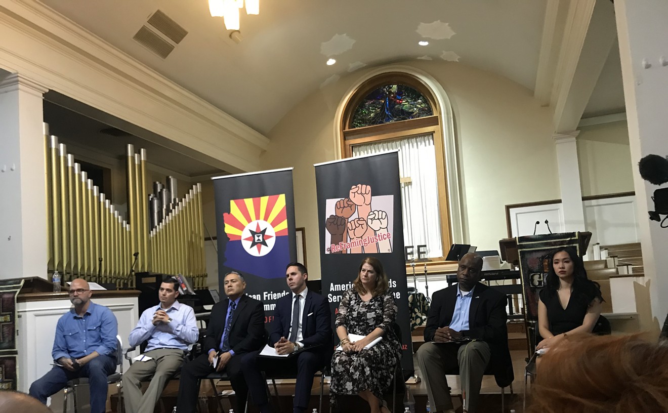 From left: Joe Watson, Danny Howe, representative Diego Rodriguez, Tim Roemer, Karen Hellman, representative Walt Blackman, and Laetitia Hua at a August 2019 town hall on conditions in state prisons.