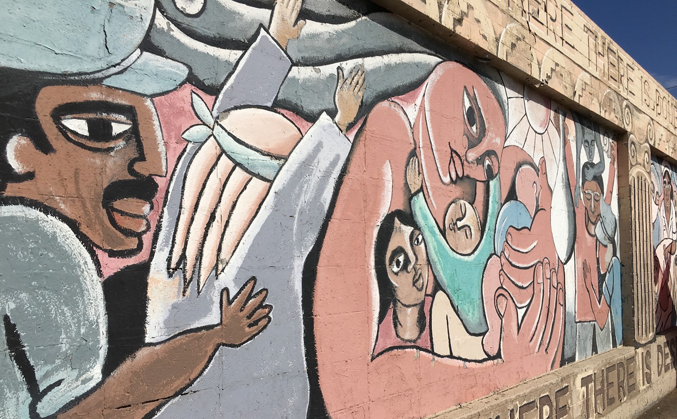 Part of Rose Johnson's mural on 16th Street before it was painted over with solid beige.