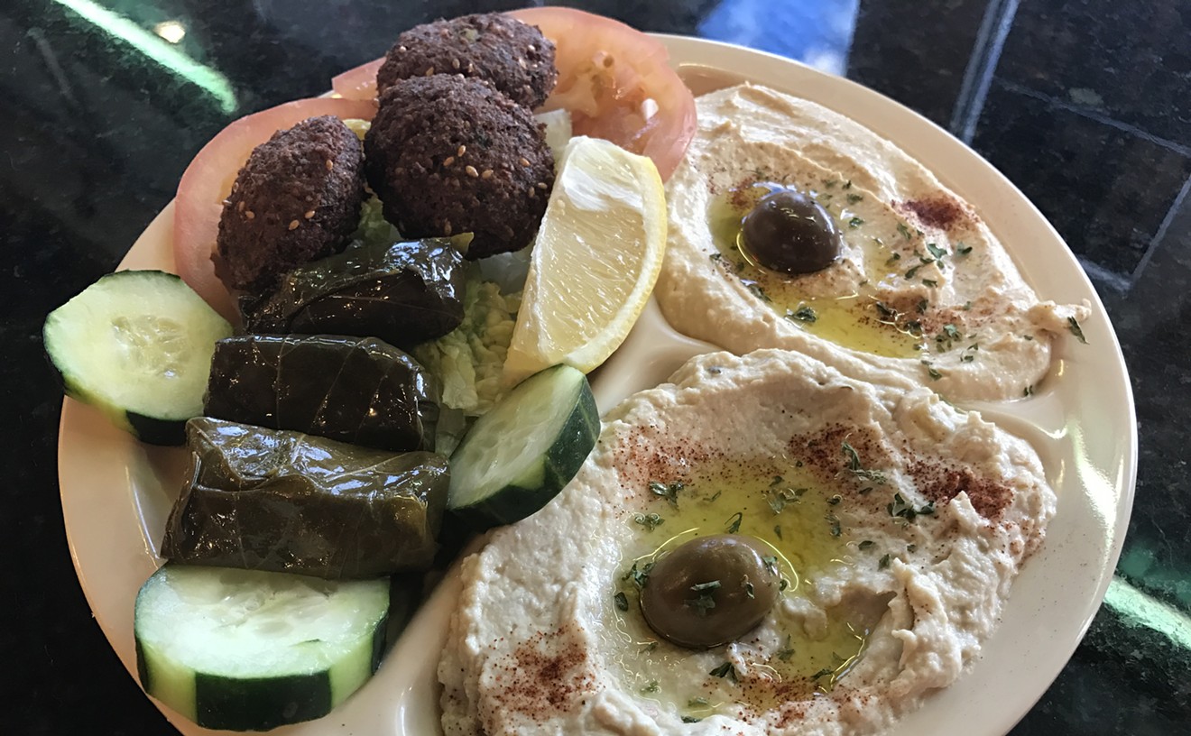 The appetizer combo at Ammos aims to please with its warm falafel, hummus, and baba ghanoush.