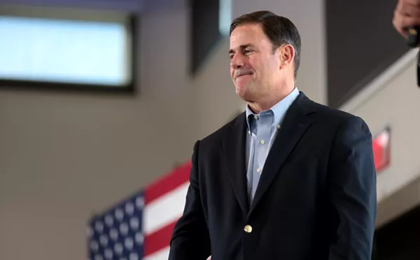 DOJ Sues Arizona Over 'Onerous' New Voting Law