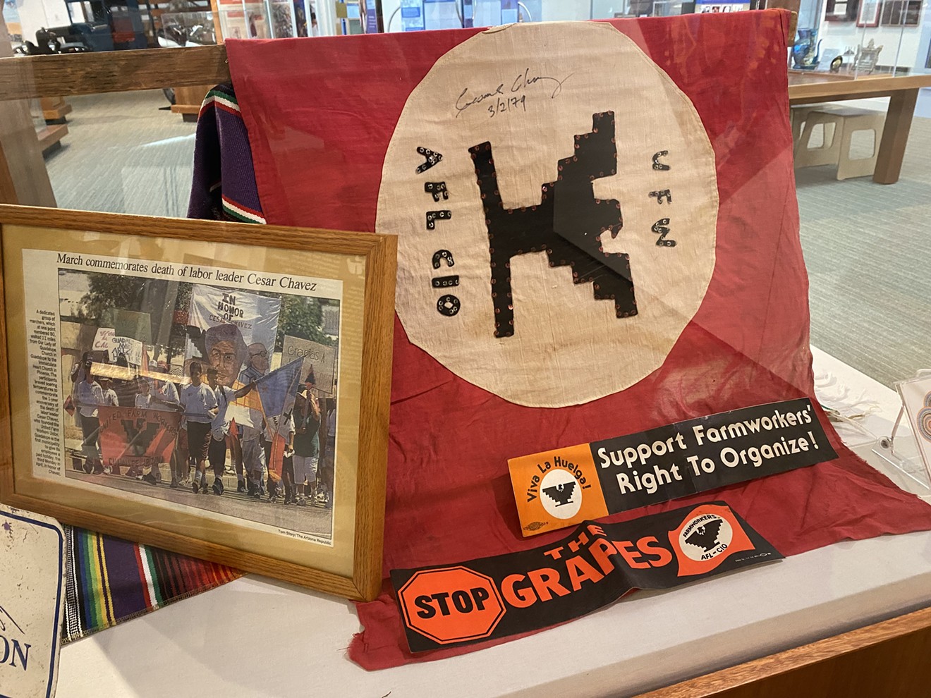 An AFL-CIO flag signed by Cesar Chavez is one of many items loaned to the Tempe History Museum for the exhibit on Guadalupe.