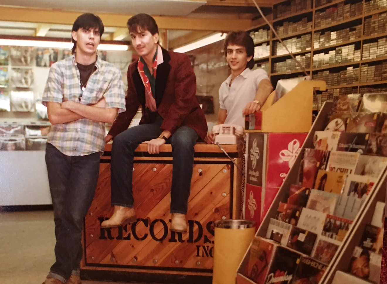 Robrt Pela (center) reflects on his time managing a Phoenix record store.