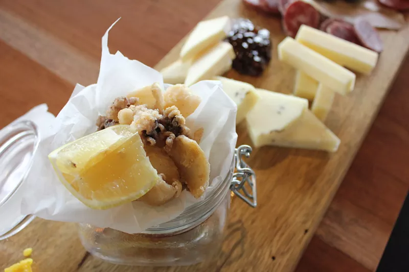 Fried cuttlefish on an appetizer board