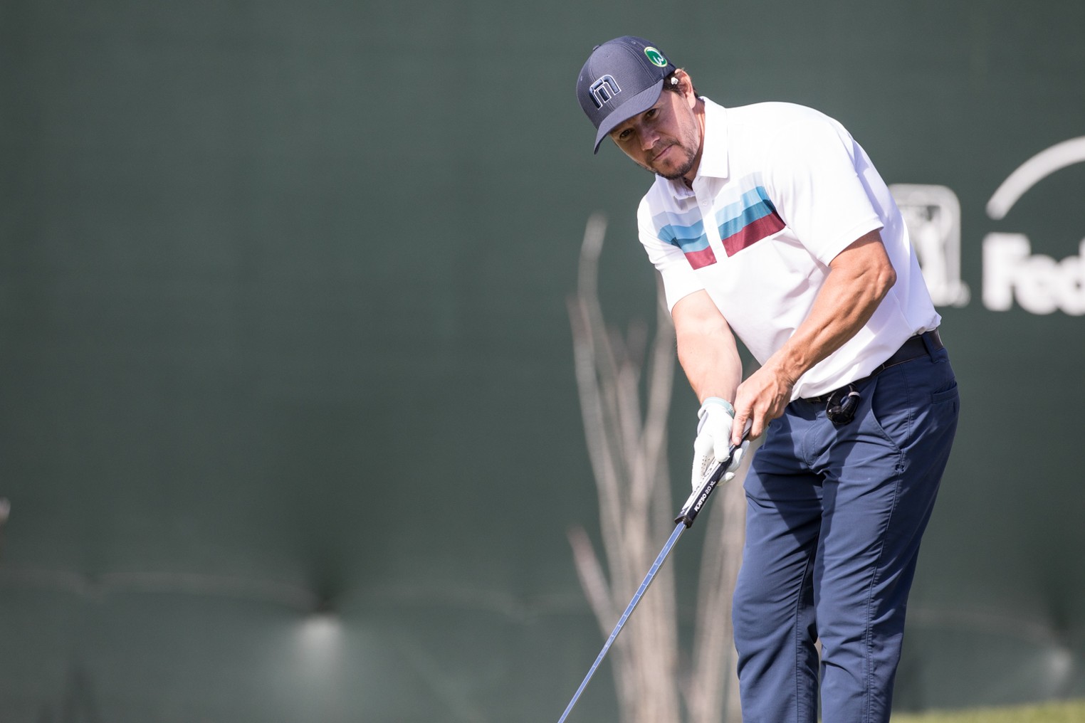 Actor Mark Wahlberg and Olympian Michael Phelps Entertain at ProAm