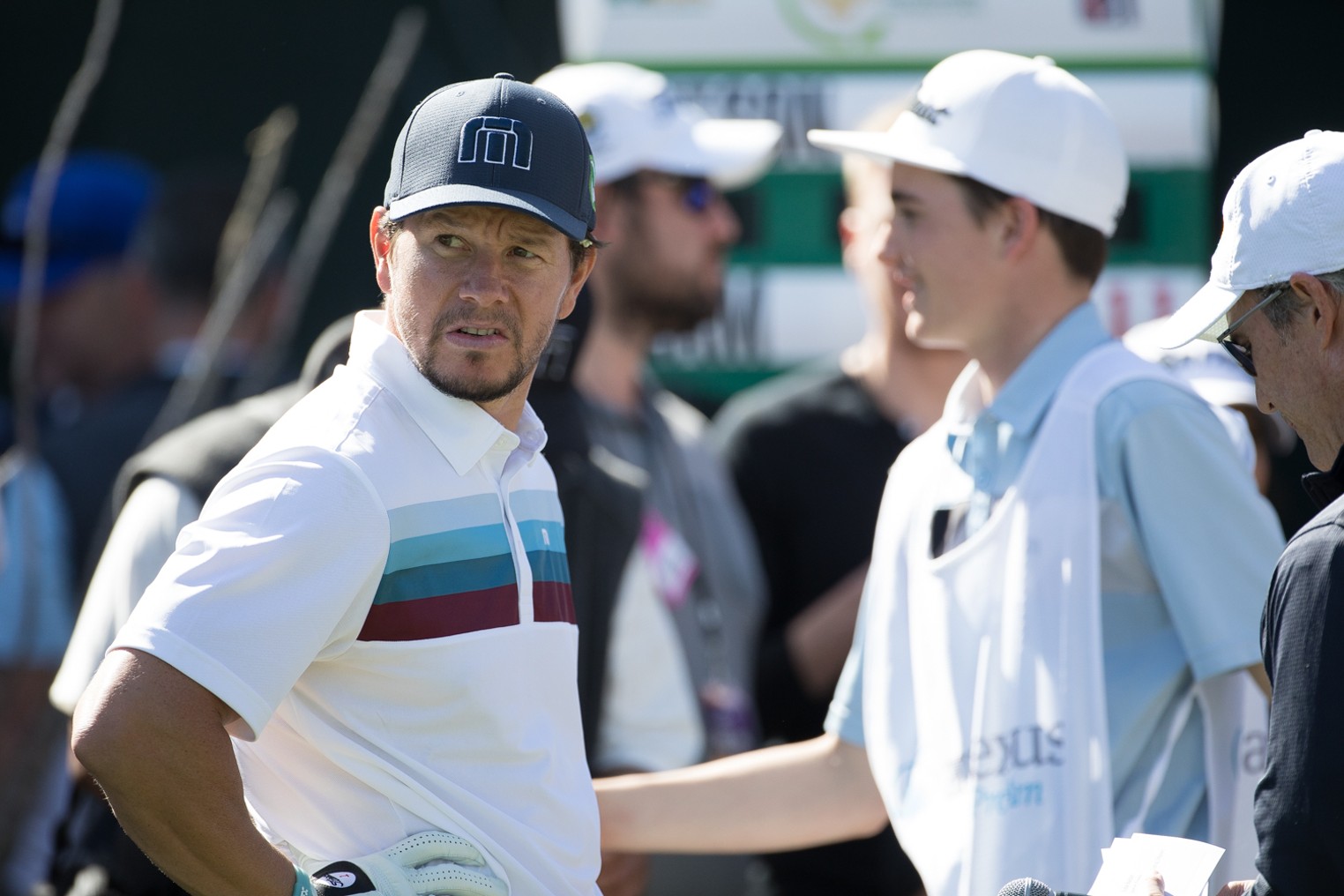 Actor Mark Wahlberg and Olympian Michael Phelps Entertain at ProAm