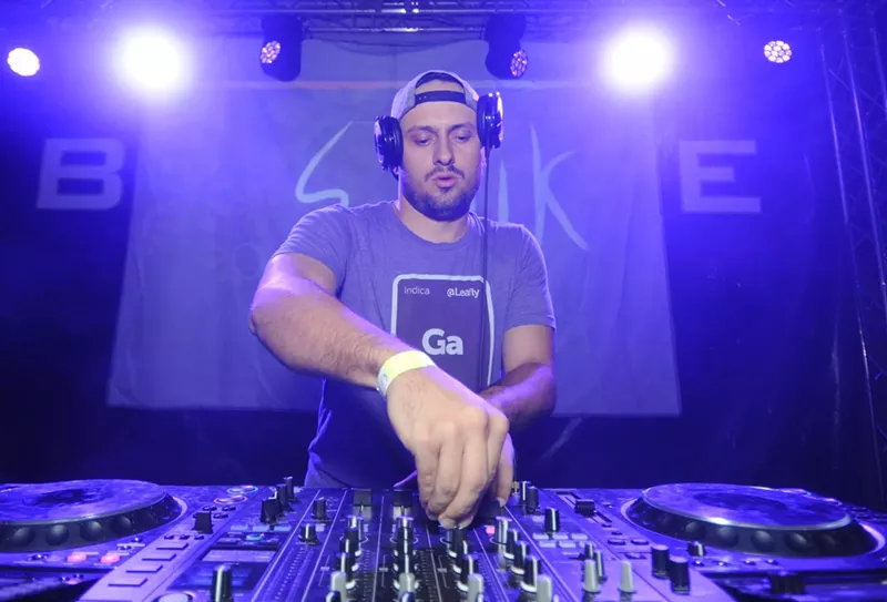 Image: A DJ performs on the outdoor stage at BLK Live in Scottsdale in 2017.