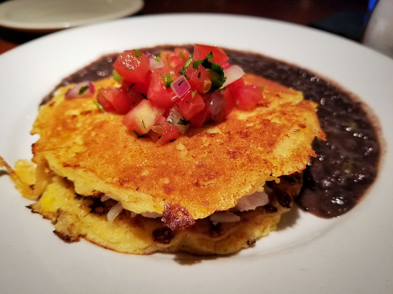 The griddled corn cakes at this uptown Phoenix restaurant are a house specialty.
