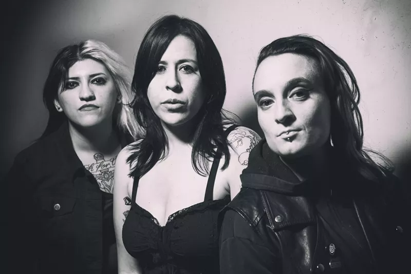 Image: When Jack Grisham of T.S.O.L. is taking your band picture, you are doing something right. The Venomous Pinks — from left, Gaby Kaos, Drea Doll, and Cassie Jalilie — and are ready to take on the world.