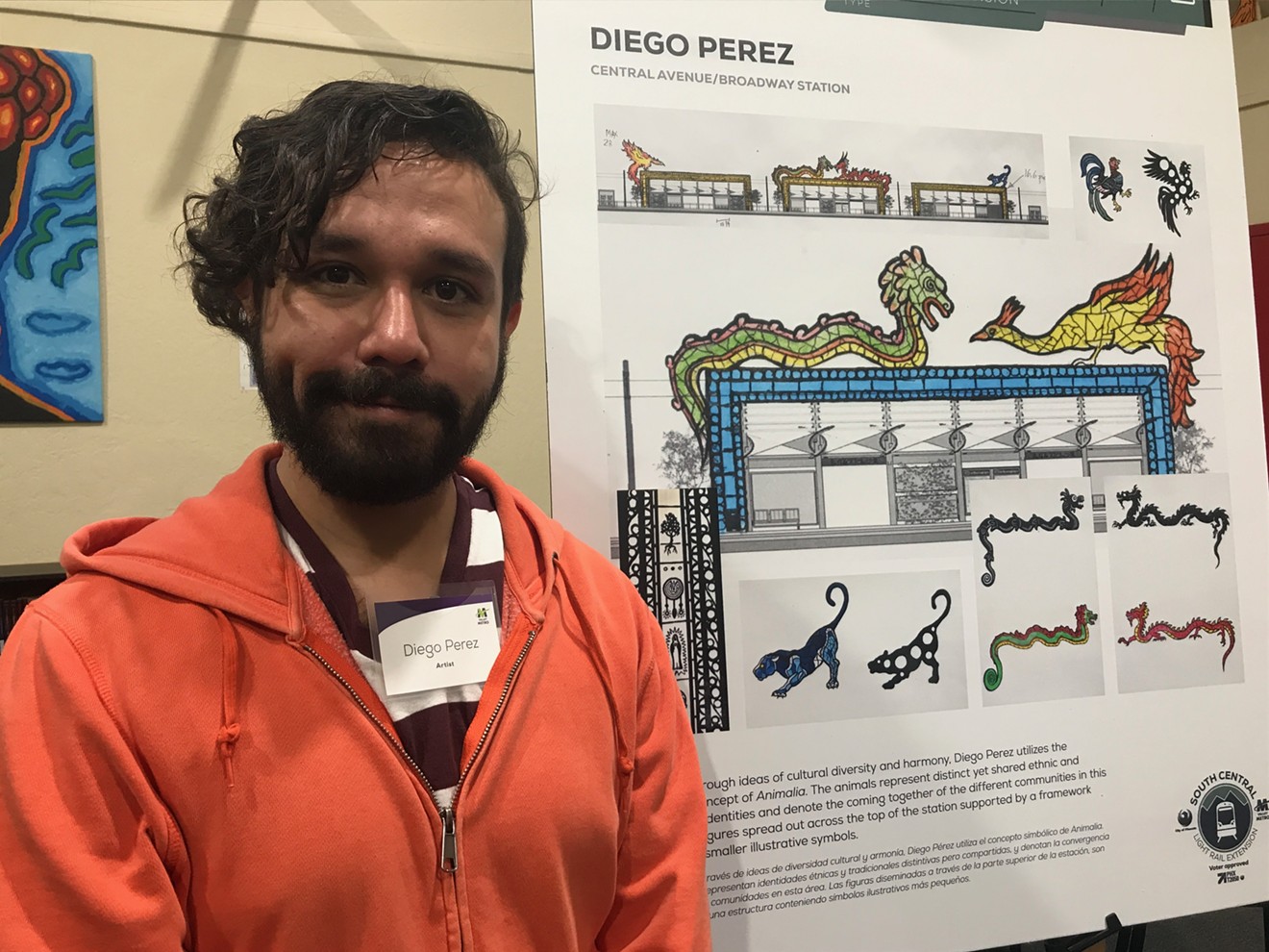 Diego Perez with an illustration for a preliminary light-rail station design.