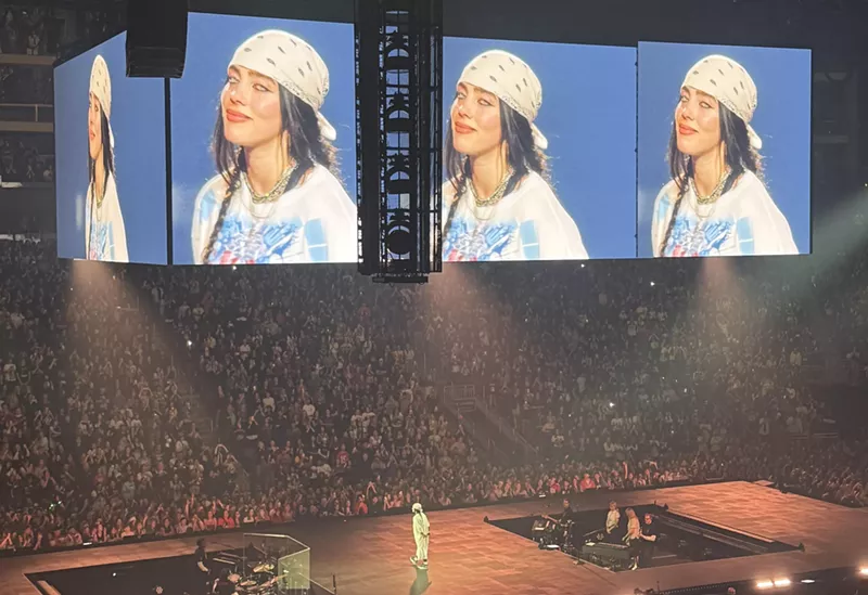 Image: A woman on stage.