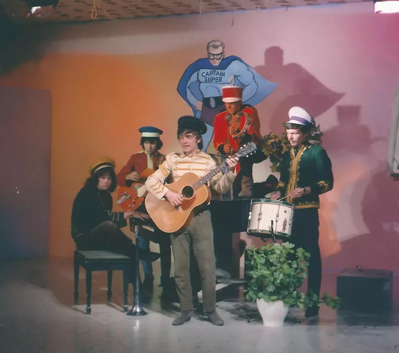 Image: Mike Condello (center) and the Salt River Navy Band pose in this undated photo.
