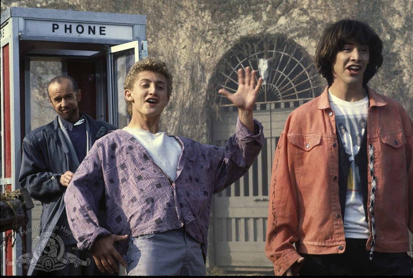 Alex Winter (center) and Keanu Reeves (right) with the late George Carlin (left) in Bill & Ted's Excellent Adventure.