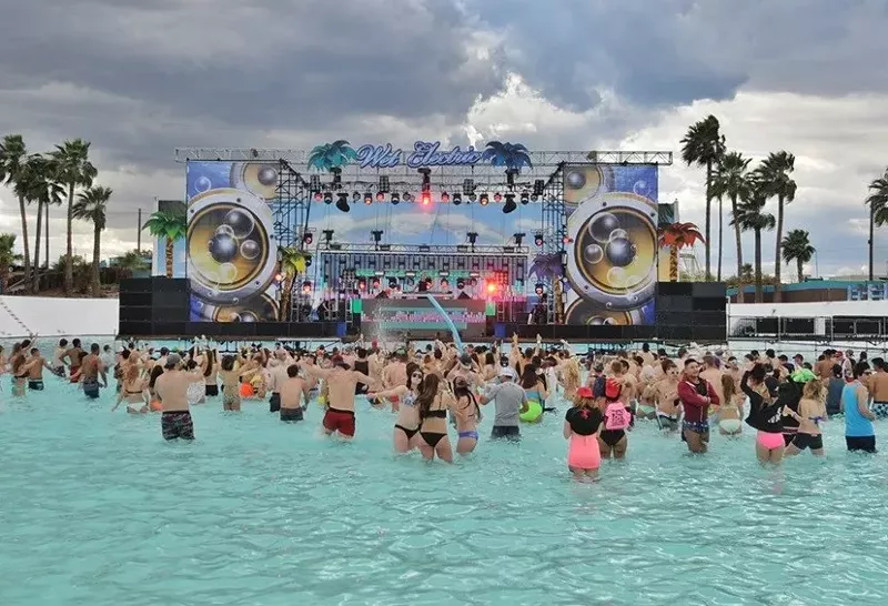 Image: Getting down in the wave pool at Big Surf in Tempe during Wet Electric.