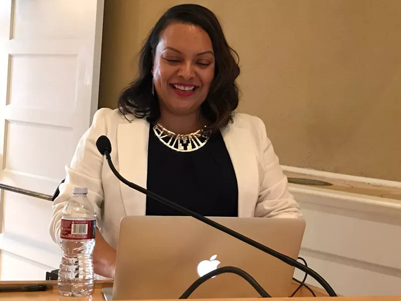 Image: Consultant Evonne Gallardo conducting the first Latino Cultural Center town hall in April 2017.