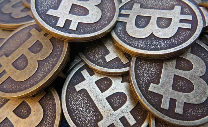 Image: A local trader of bitcoins, the popular online cryptocurrency, was a focus of a federal task force raid in Mesa last week.
