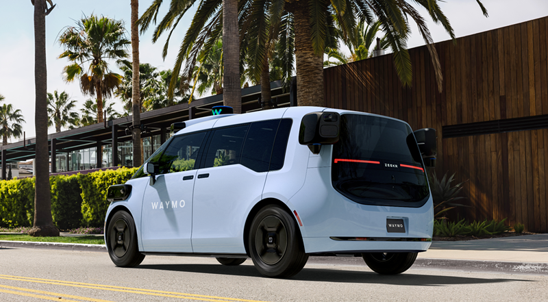 Image: a blue van-like car
