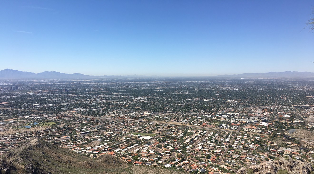 Phoenix's notorious haze is visible in a brown layer along the horizon. Ethylene oxide is invisible.